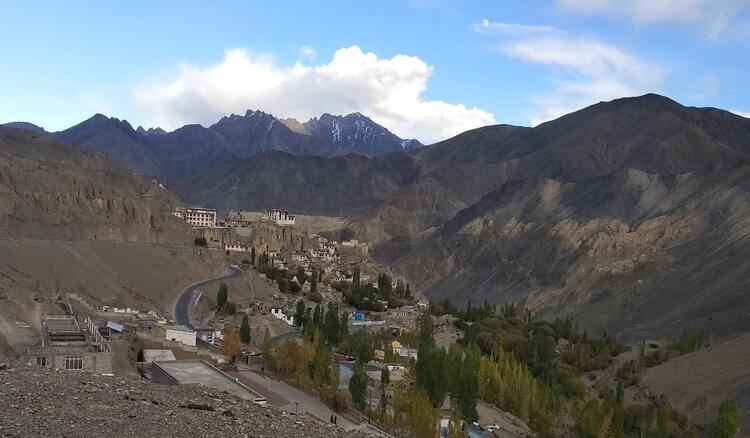 Lamayuru village and monastery nestled in high mountains Lamayuru village and monastery nestled in high mountains